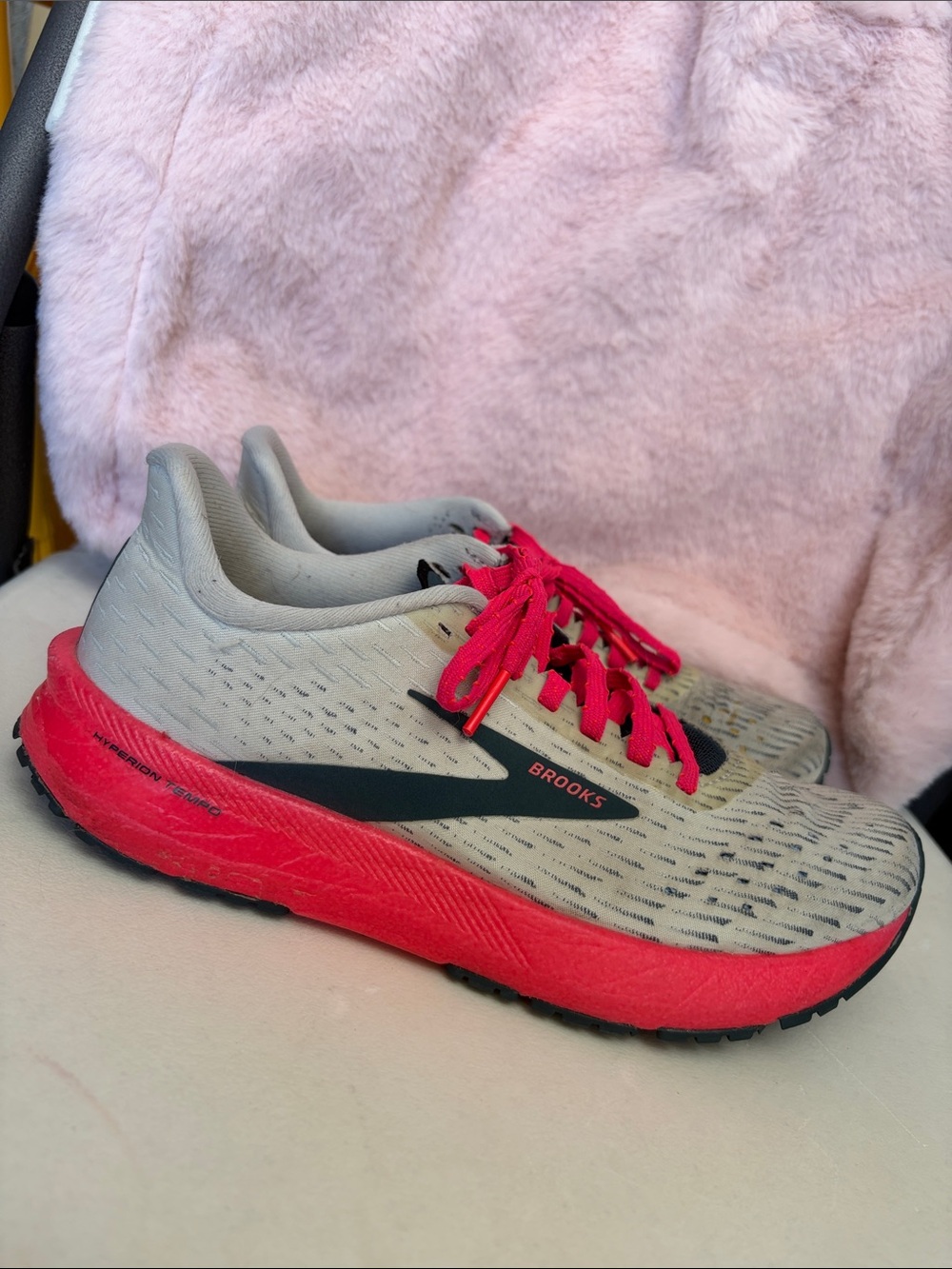 Brooks Neutral Gray Running Shoe with Bright Pink Accents